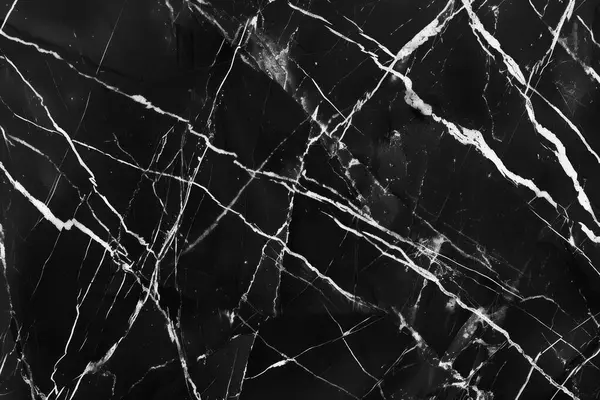 Siyah mutfak mermeri desenli beyaz damarlı bir fotoğraf. Arkaplan veya haritalama için arkaplan dokusu