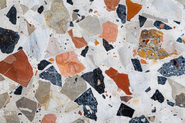 Zemin yüzeyindeki gri terrazzo parçacıklarının fotoğrafı. Arkaplan veya haritalama için arkaplan dokusu