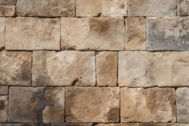 Antik sarı blok duvar dokusunun işlenmiş kolajı. Pankart, arkaplan veya 3B haritalama için doku