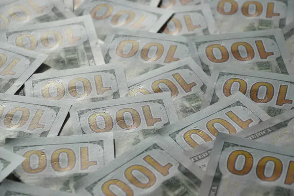 Birçok yüz dolarlık banknot dokusunun işlenmiş kolajı. Pankart, arkaplan veya 3B haritalama için doku