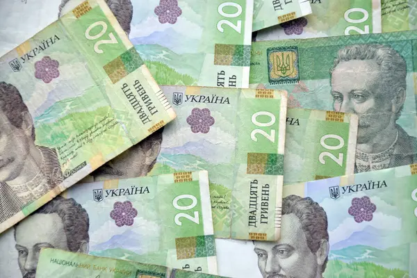 Ukrayna 'nın işlenmiş Hryvnia UAH kolajı banknotların dokusunu destekler. Pankart, arkaplan veya 3B haritalama için doku