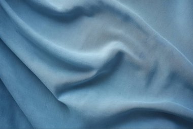 Katlanmış kolajın işlenmiş kolajı kot mavi kumaş dokusunu denetler. Pankart, arkaplan veya 3B haritalama için doku