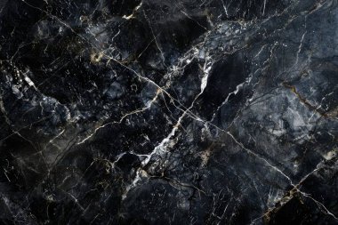 Beyaz damarlı koyu siyah mermer desenli fotoğraf. Arkaplan veya haritalama için arkaplan dokusu
