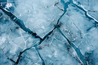 Kalın ve dondurucu buz yüzeyinin fotoğrafı. Arkaplan veya haritalama için arkaplan dokusu