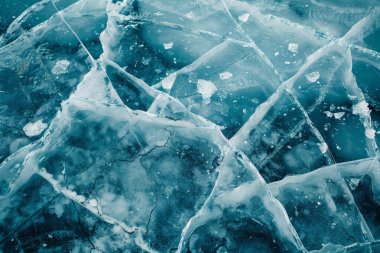 Kalın ve dondurucu buz yüzeyinin fotoğrafı. Arkaplan veya haritalama için arkaplan dokusu