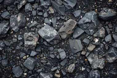 Gri asfalt kaya döküntülerinin fotoğrafı. Arkaplan veya haritalama için arkaplan dokusu