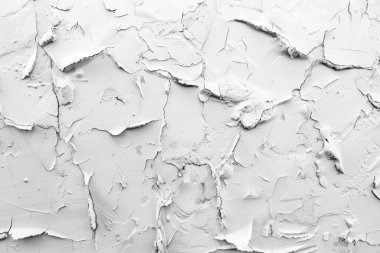 Kabuğu soyulmuş beyaz alçı duvarın fotoğrafı. Arkaplan veya haritalama için arkaplan dokusu
