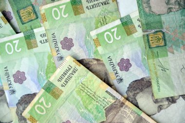 Ukrayna 'nın işlenmiş Hryvnia UAH kolajı banknotların dokusunu destekler. Pankart, arkaplan veya 3B haritalama için doku