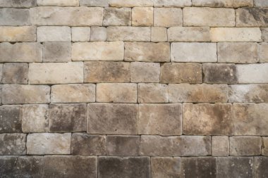 Antik sarı blok duvar dokusunun işlenmiş kolajı. Pankart, arkaplan veya 3B haritalama için doku