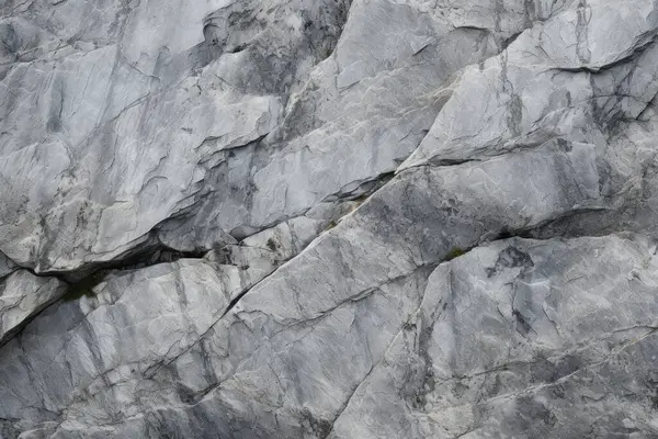 Dağ kayalığı kaya yüzey dokusunun işlenmiş kolajı. Pankart, arkaplan veya 3B haritalama için doku