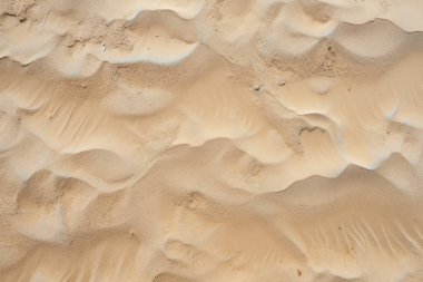 Deniz kıyısı kumlarının işlenmiş kolajı yüzey dokusu. Pankart, arkaplan veya 3B haritalama için doku