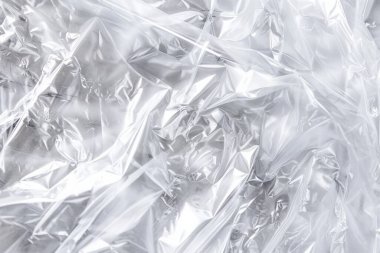 Buruşmuş politen plastik ambalaj kağıdının fotoğrafı. Arkaplan veya haritalama için arkaplan dokusu