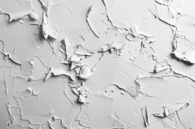 Kabuğu soyulmuş beyaz alçı duvarın fotoğrafı. Arkaplan veya haritalama için arkaplan dokusu