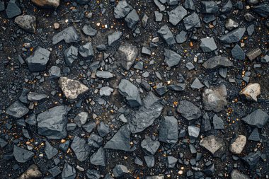 Gri asfalt kaya döküntülerinin fotoğrafı. Arkaplan veya haritalama için arkaplan dokusu
