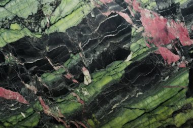 Zoisite tanzanit taşından işlenmiş kolaj mor ve yeşil doku. Pankart, arkaplan veya 3B haritalama için doku