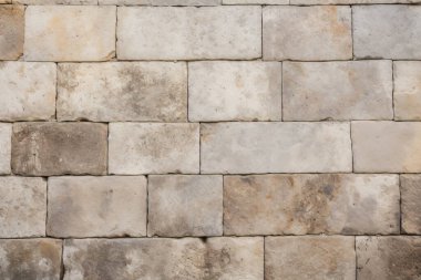 Antik sarı blok duvar dokusunun işlenmiş kolajı. Pankart, arkaplan veya 3B haritalama için doku