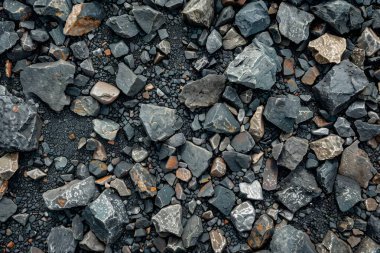 Gri asfalt kaya döküntülerinin fotoğrafı. Arkaplan veya haritalama için arkaplan dokusu