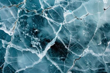 Kalın ve dondurucu buz yüzeyinin fotoğrafı. Arkaplan veya haritalama için arkaplan dokusu