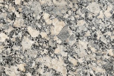 Doğal kaba granit desenli fotoğraf. Yakın çekim. Arkaplan veya haritalama için arkaplan dokusu