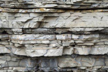 Sedimenter katmanlı kaya dokusunun fotoğrafı. Arkaplan veya haritalama için arkaplan dokusu