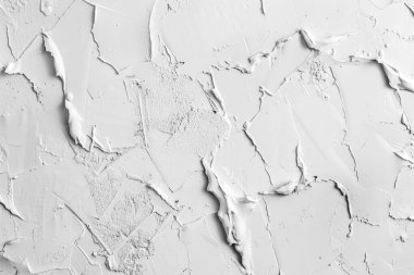 Kabuğu soyulmuş beyaz alçı duvarın fotoğrafı. Arkaplan veya haritalama için arkaplan dokusu