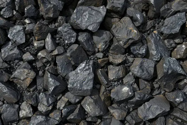 Büyük doğal siyah kömür yığınının fotoğrafı. Arkaplan veya haritalama için arkaplan dokusu