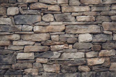 Gündüz vakti eski ortaçağ taş duvar dokusunun işlenmiş kolajı. Pankart, arkaplan veya 3B haritalama için doku