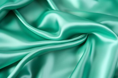 Zümrüt yeşili ipek yüzey dokusunun işlenmiş kolajı. Pankart, arkaplan veya 3B haritalama için doku