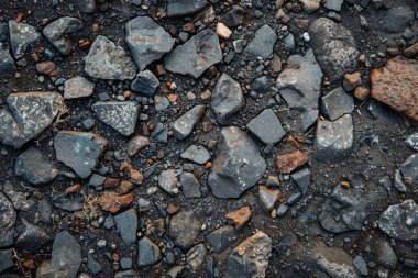 Gri asfalt kaya döküntülerinin fotoğrafı. Arkaplan veya haritalama için arkaplan dokusu
