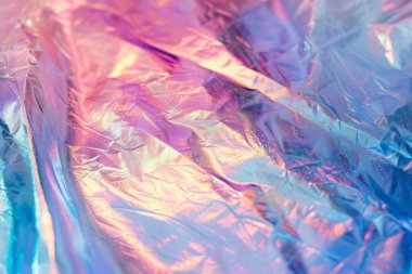 Holografik yanardöner efektinin fotoğrafı. Plastik maddeyi yakından çek. Arkaplan veya haritalama için arkaplan dokusu