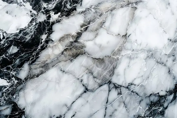 Siyah ve beyaz mutfak mermeri desenli, damarları yakın. Arkaplan veya haritalama için arkaplan dokusu