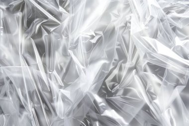 Buruşmuş politen plastik ambalaj kağıdının fotoğrafı. Arkaplan veya haritalama için arkaplan dokusu