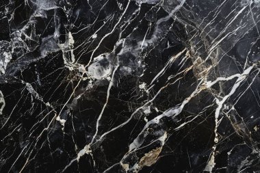 Siyah mutfak mermeri desenli beyaz damarlı bir fotoğraf. Arkaplan veya haritalama için arkaplan dokusu