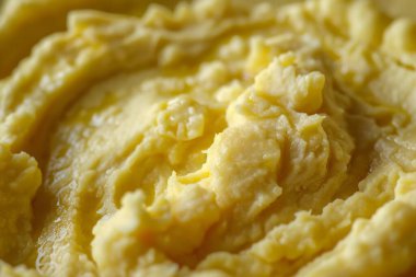 Sarı patates püre desenli fotoğraf yakın çekim. Arkaplan ya da yemek tarifleri için yemek fotoğrafı