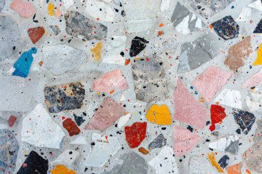 Zemin yüzeyindeki gri terrazzo parçacıklarının fotoğrafı. Arkaplan veya haritalama için arkaplan dokusu