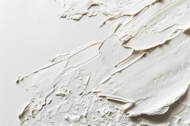 Düz yüzeydeki birçok akrilik yağlı boya lekelerinin fotoğrafı. Arkaplan veya haritalama için arkaplan dokusu