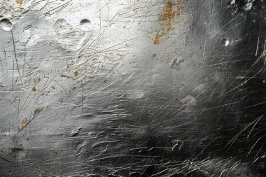 Silver 'ın fotoğrafı eski metal levhayı tırmalamış. Arkaplan veya haritalama için arkaplan dokusu