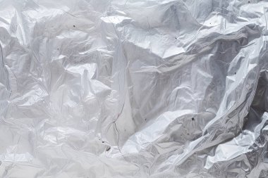 Şeffaf selofan plastik folyo dokusunun işlenmiş kolajı. Pankart, arkaplan veya 3B haritalama için doku