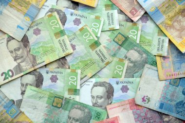 Ukrayna 'nın işlenmiş Hryvnia UAH kolajı banknotların dokusunu destekler. Pankart, arkaplan veya 3B haritalama için doku