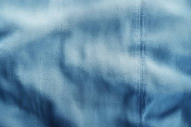 Katlanmış kolajın işlenmiş kolajı kot mavi kumaş dokusunu denetler. Pankart, arkaplan veya 3B haritalama için doku