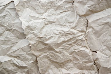 Buruşuk kağıt, karton arka plan. Kahverengi kraft yaprak dokusu, yırtık antika sayfa, duvar kağıdı veya parşömen soyut tasarımı, yatay kaba karton, eski malzeme