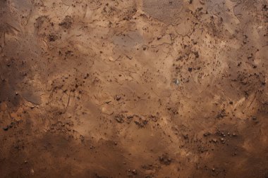 İşlenmiş kolaj eski kuru kahverengi kil yüzey dokusu. Pankart, arkaplan veya 3B haritalama için doku