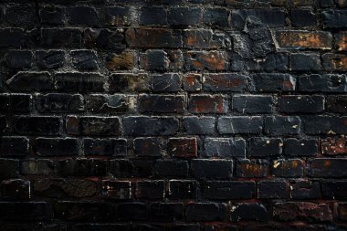 Eski getto siyah tuğla duvarının fotoğrafı. Arkaplan veya haritalama için arkaplan dokusu