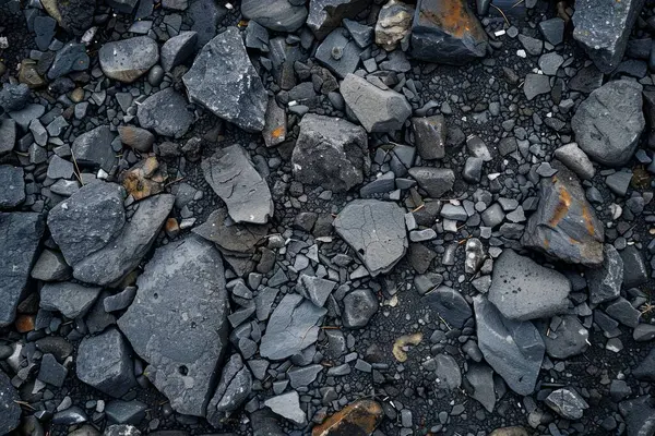 Gri asfalt kaya döküntülerinin fotoğrafı. Arkaplan veya haritalama için arkaplan dokusu
