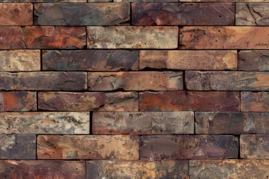 Eski kahverengi tuğla duvarın fotoğrafı. Arkaplan veya haritalama için arkaplan dokusu