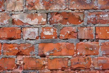 Eski çatlak kırmızı tuğla duvarın fotoğrafı. Endüstri bölgesinden. Yakından. Arkaplan veya haritalama için arkaplan dokusu