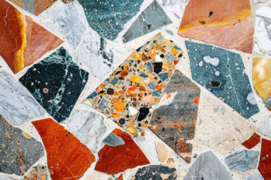 Zemin yüzeyindeki gri terrazzo parçacıklarının fotoğrafı. Arkaplan veya haritalama için arkaplan dokusu