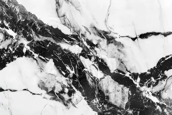 Siyah ve beyaz mutfak mermeri desenli, damarları yakın. Arkaplan veya haritalama için arkaplan dokusu