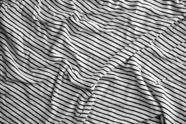 Birçok katlı, soyut siyah ve beyaz soyulmuş kumaş arkaplan kolajı.