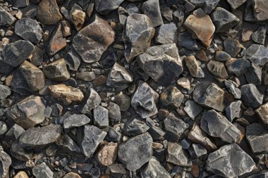 Gri çakıl taşı enkazı fotoğrafı. Yaklaş. Arkaplan veya haritalama için arkaplan dokusu